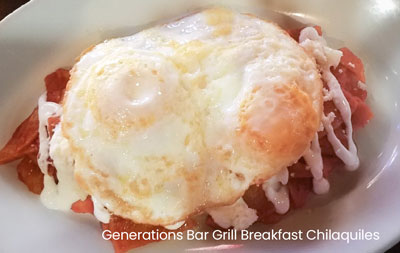 A plate of breakfast chilaquiles topped with a sunny-side-up egg, served at Generations Bar Grill in Sherwood.