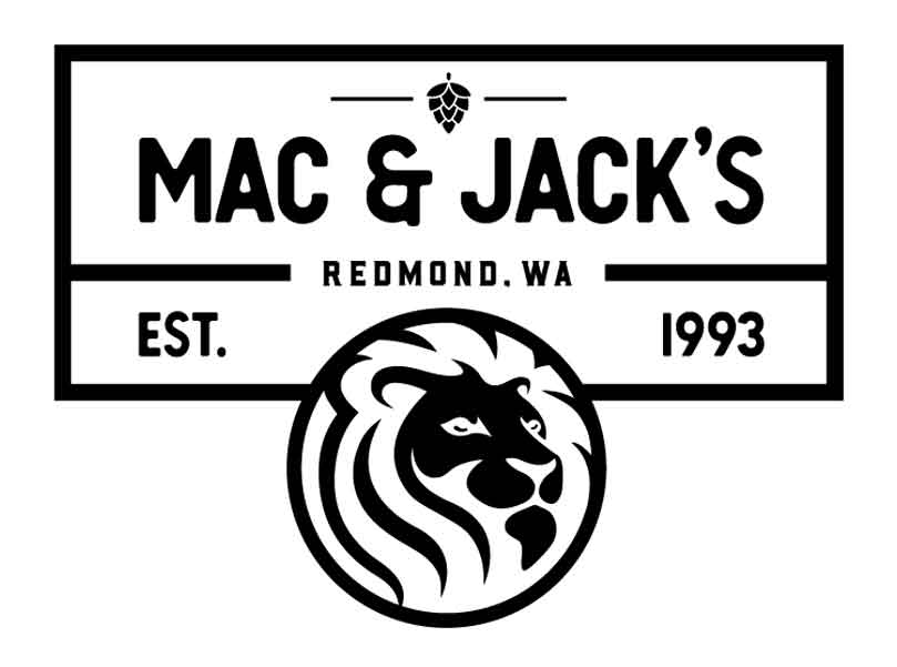 Circular logo for Mac & Jack's Brewing Co. features a bold lion's head in the center, with hops on sides and text "Wholehearted Beer" encircling it.